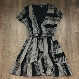 Francesca’s gray and black wrap dress